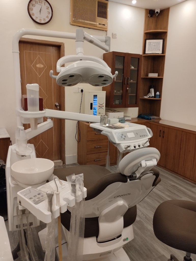 Close view of dental chair and overhead light