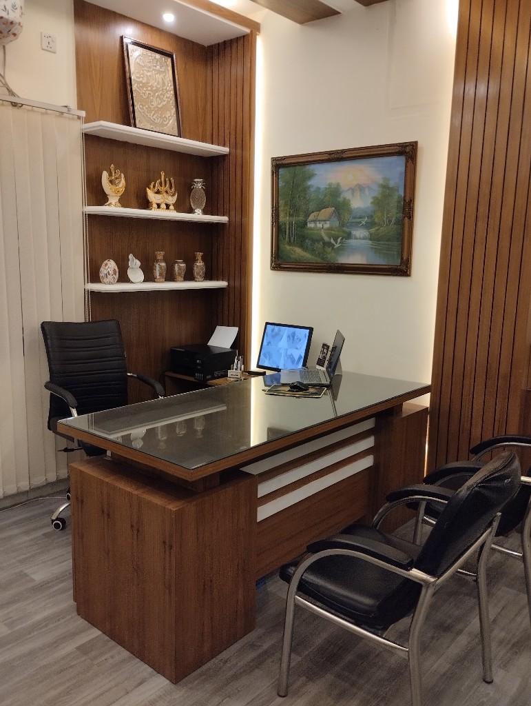 Alternate view of doctor’s office with decor and artwork